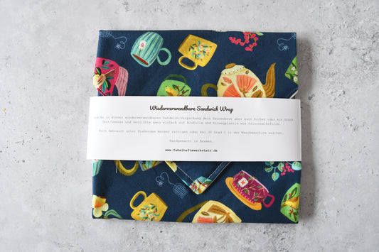 Geschlossener waschbarer Sandwich Wrap von Fabelhafte Werkstatt mit Papierbanderole und Produktbeschreibung.