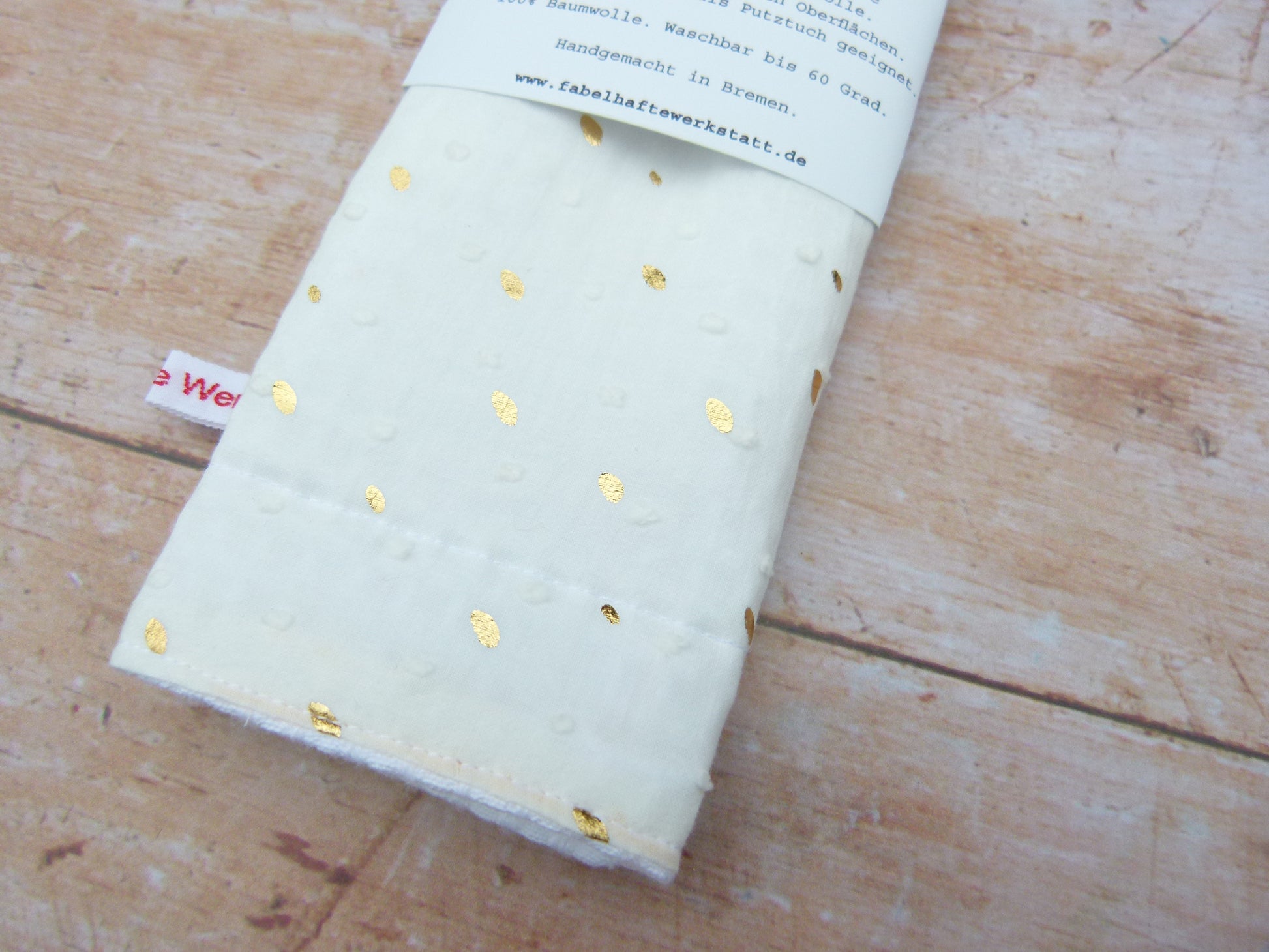 Nachhaltiges Spültuch in elegantem Cremeweiß mit goldenen Punkten von Fabelhaftewerkstatt.