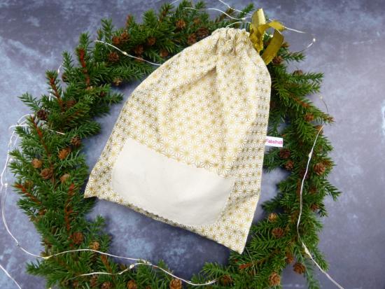 Geschenkbeutel (Sternenmuster gold)