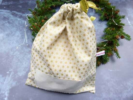 Geschenkbeutel (Sternenmuster gold)