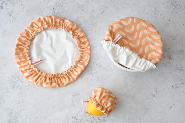 Schüsselhaube "Blätterranken auf Apricot"
